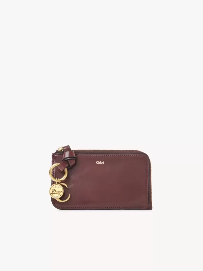 Cartera con alfabeto en piel brillante Cartera con alfabeto en piel brillante