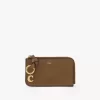 Cartera con alfabeto en piel brillante