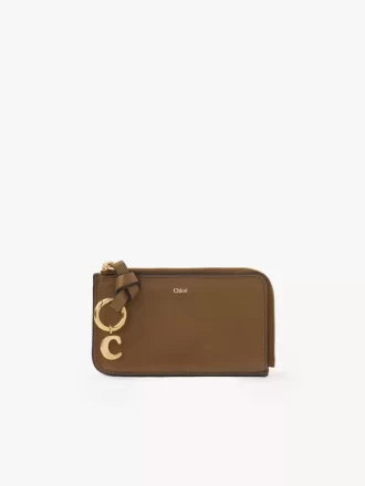 Cartera con alfabeto en piel brillante
