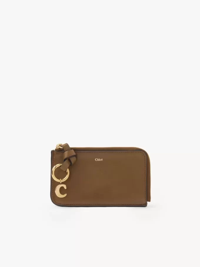 Cartera con alfabeto en piel brillante
