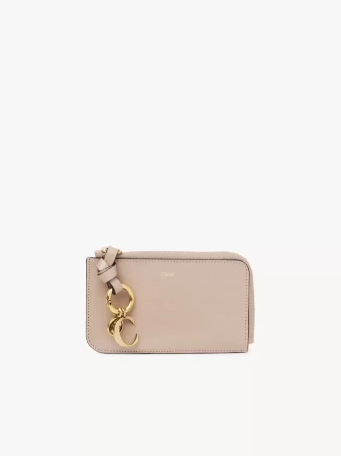 Cartera con alfabeto en piel brillante Cartera con alfabeto en piel brillante