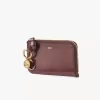 Cartera con alfabeto en piel brillante Cartera con alfabeto en piel brillante