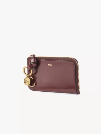 Cartera con alfabeto en piel brillante