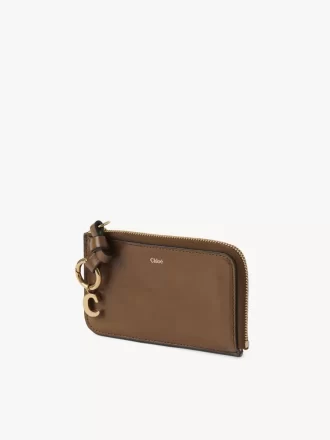 Cartera con alfabeto en piel brillante