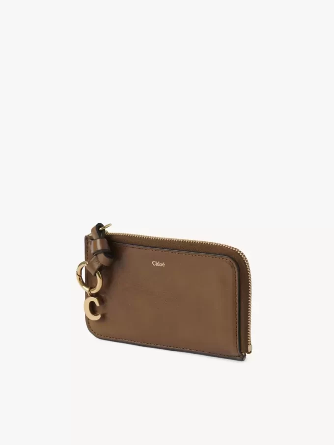 Cartera con alfabeto en piel brillante