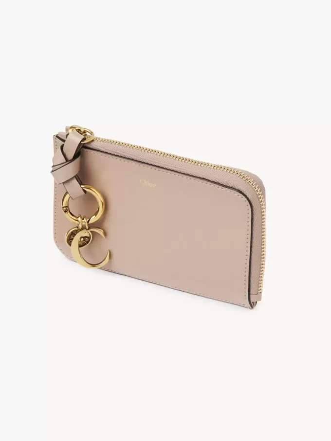 Cartera con alfabeto en piel brillante Cartera con alfabeto en piel brillante