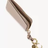 Cartera con alfabeto en piel brillante Cartera con alfabeto en piel brillante