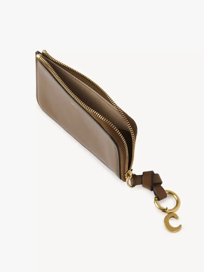Cartera con alfabeto en piel brillante