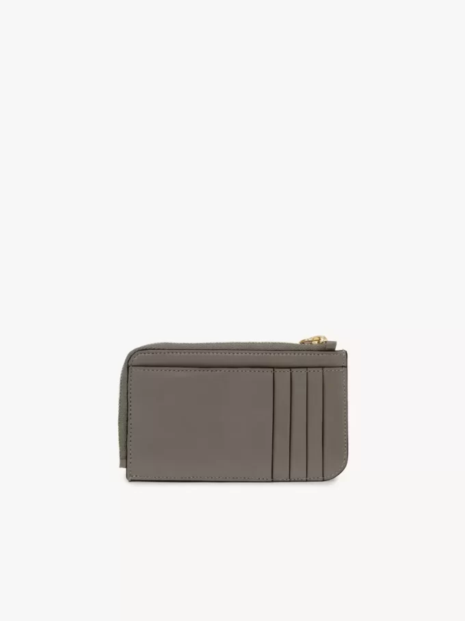 Cartera con alfabeto en piel brillante Cartera con alfabeto en piel brillante