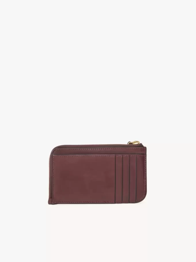 Cartera con alfabeto en piel brillante Cartera con alfabeto en piel brillante
