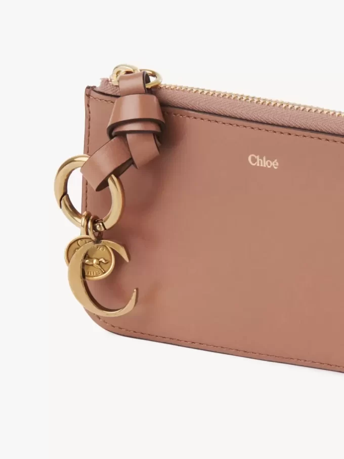 Cartera con alfabeto en piel brillante Cartera con alfabeto en piel brillante
