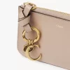 Cartera con alfabeto en piel brillante Cartera con alfabeto en piel brillante