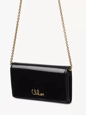 Cartera con solapa y cadena Chloé Iconic en charol