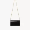 Cartera con solapa y cadena Chloé Iconic en charol