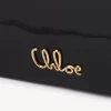Cartera con solapa y cadena Chloé Iconic en charol