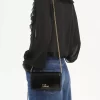 Cartera con solapa y cadena Chloé Iconic en charol