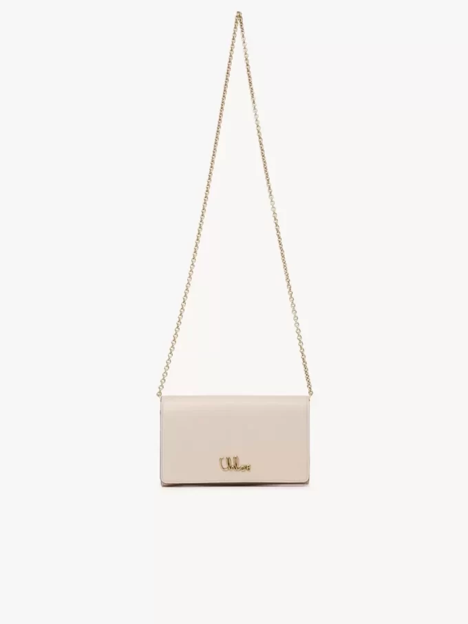 Cartera con solapa y cadena Chloé Iconic en piel brillante