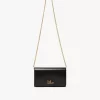 Cartera con solapa y cadena Chloé Iconic en piel brillante