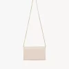 Cartera con solapa y cadena Chloé Iconic en piel brillante