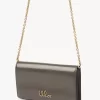 Cartera con solapa y cadena Chloé Iconic en piel brillante