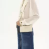 Cartera con solapa y cadena Chloé Spin en piel granulada