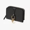 Cartera plegable con alfabeto en piel brillante Cartera plegable con alfabeto en piel brillante