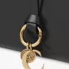 Cartera plegable con alfabeto en piel brillante Cartera plegable con alfabeto en piel brillante
