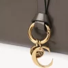 Cartera plegable con alfabeto en piel brillante Cartera plegable con alfabeto en piel brillante