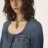 Chaqueta de montar peplum en denim Chaqueta de montar peplum en denim