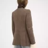 Chaqueta larga de oficial en lana con diseño de espiga Chaqueta larga de oficial en lana con diseño de espiga