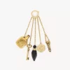 Charm Château Treasures en latón y resina