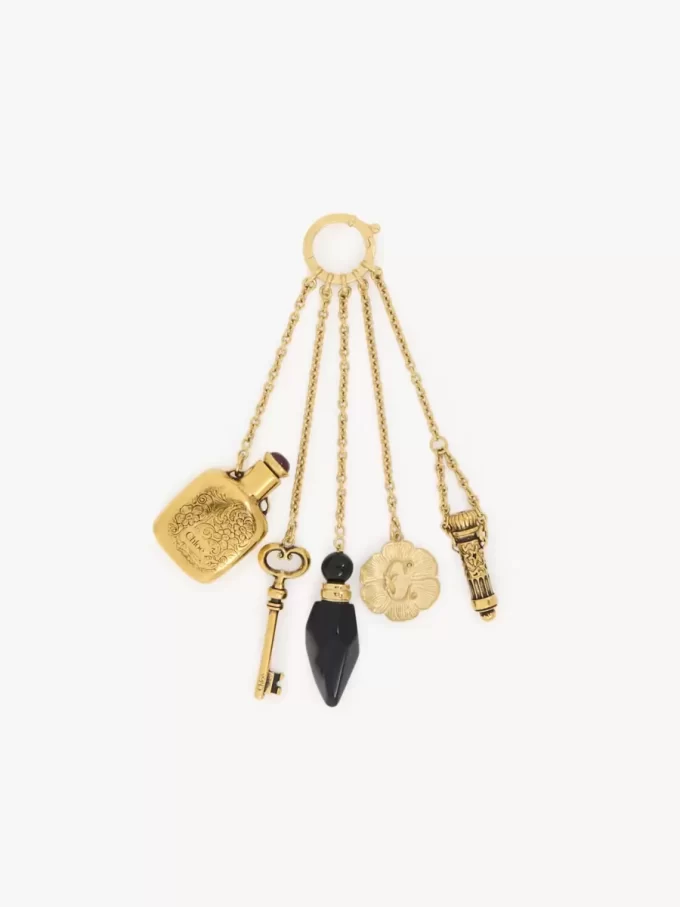 Charm Château Treasures en latón y resina
