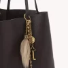 Charm para bolso Chloé Symbols de latón y piel de oveja Charm para bolso Chloé Symbols de latón y piel de oveja