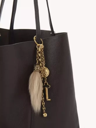 Charm para bolso Chloé Symbols de latón y piel de oveja