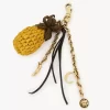 Charm para bolso con forma de piña en rafia, metal y piel