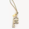 Charm para bolso con logo en piel brillante Charm para bolso con logo en piel brillante