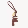 Charm para bolso con logo en piel brillante