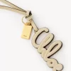 Charm para bolso con logo en piel brillante Charm para bolso con logo en piel brillante