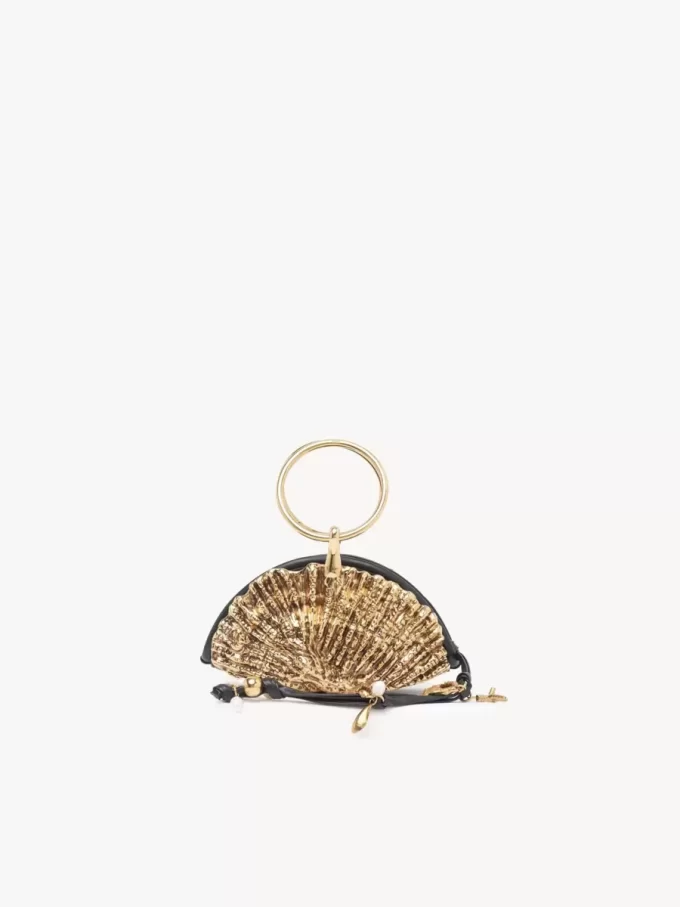 Clutch con cremallera Sea Treasures Shell en piel suave y metal Clutch con cremallera Sea Treasures Shell en piel suave y metal