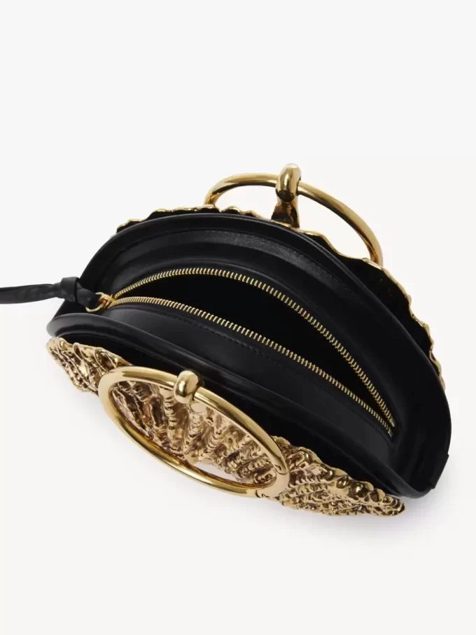 Clutch con cremallera Sea Treasures Shell en piel suave y metal Clutch con cremallera Sea Treasures Shell en piel suave y metal