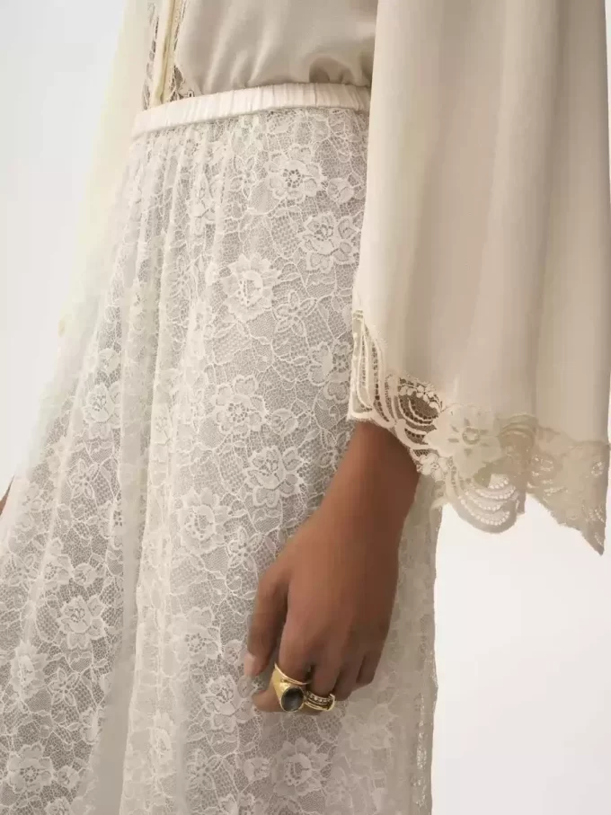 Falda midi con volantes en jacquard de encaje floral