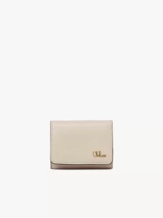 Mini Chloé Iconic tríptica en piel brillante