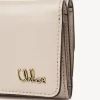 Mini Chloé Iconic tríptica en piel brillante