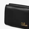 Mini Chloé Iconic tríptica en piel brillante