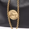 Mochila pequeña de pulsera en piel granulada Mochila pequeña de pulsera en piel granulada