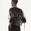 Mochila pequeña de pulsera en piel granulada Mochila pequeña de pulsera en piel granulada