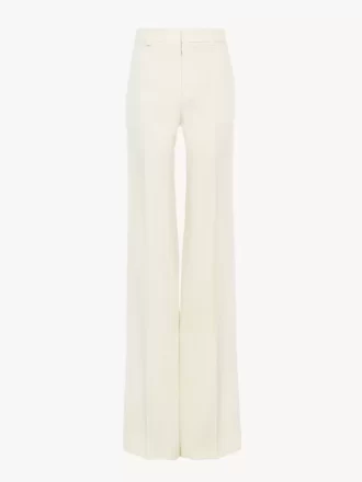 Pantalones acampanados de tiro alto en lana grain de poudre