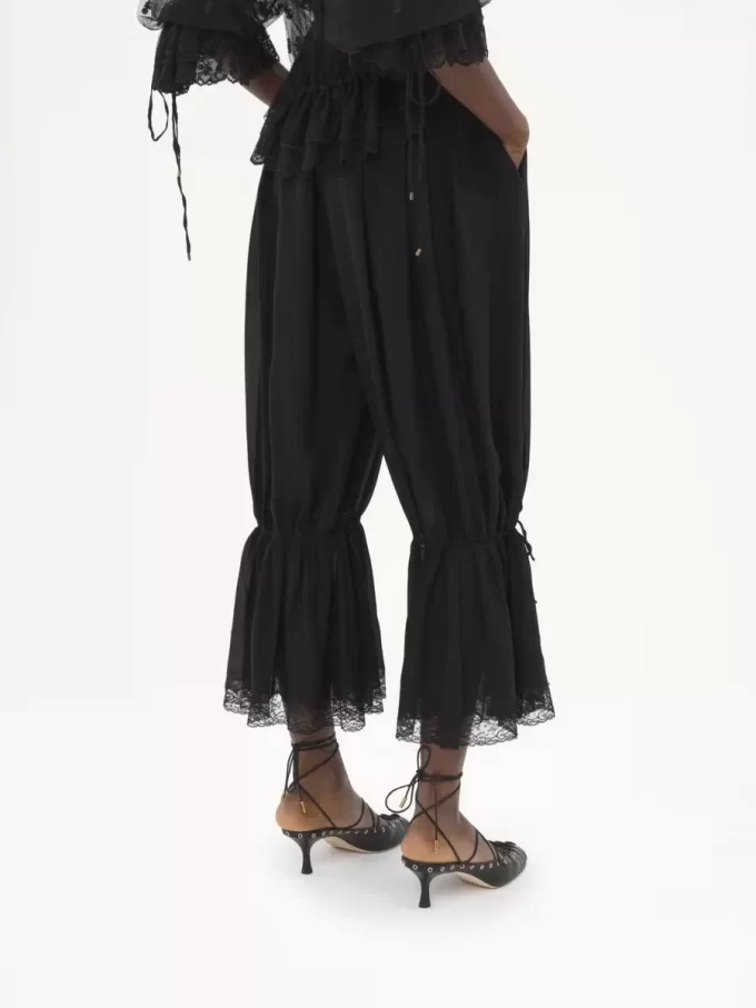 Pantalones fluidos cropped en charmeuse de seda y encaje