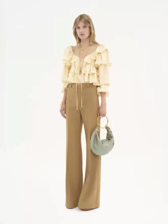 Pantalones sastre acampanados de lana grain de poudre