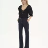Pantalones sastre de estilo juvenil en lana elástica